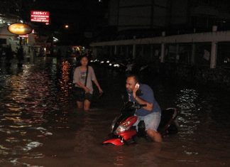 The leading edge of Tropical Storm Gaemi packed a major punch, causing floods throughout Pattaya. Here, a tourist tries to evacuate his motorcycle from Soi Marine Plaza just off Waling Street late Friday night / early Saturday morning. But as the entire kingdom battened down the hatches, expecting the worst, the storm lost strength over land and fizzled as it passed overhead.
