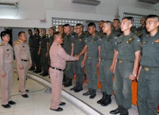 Capt. Chusak Bunthat congratulates students of the Thai Marine Corps Officer Advanced Training course.