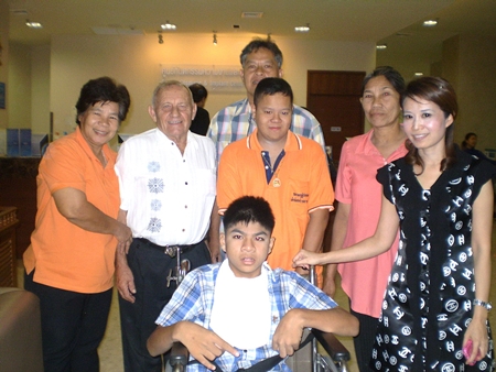 (L to R) Boonchu, Bernie, Jedwiron, Jirasak (in wheelchair), Noy, president of YWCA Pattaya and his two grandparents (in back). 