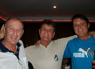 Sunday’s winners Lou Szigligeti, center, and Mark Wood, right, with golf manager Colin Davis.