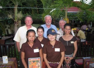 Tuesday’s winners and Relax Bar staff members pose for a group photo.