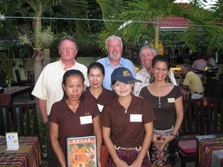 Tuesday’s winners and Relax Bar staff members pose for a group photo. 