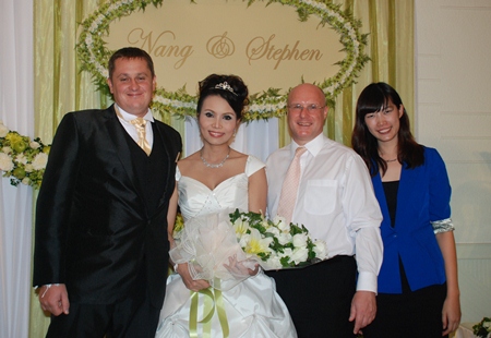 David Cumming (2nd right), Area General Manager of Amari, congratulates Walaiporn Chamnan and Stephen Alexander, the lucky winners of the Amari Orchid Pattaya Win a Wedding competition. The combined value of the prizes was in excess of 250,000 baht, sponsored by Baan Ton Rak Studio, The Sis souvenir shop, Prestige Diamonds, Meko Clinic, Photo One studio and Bangkok Hospital Pattaya. David Cumming (2nd right), Area General Manager of Amari, congratulates Walaiporn Chamnan and Stephen Alexander, the lucky winners of the Amari Orchid Pattaya Win a Wedding competition. The combined value of the prizes was in excess of 250,000 baht, sponsored by Baan Ton Rak Studio, The Sis souvenir shop, Prestige Diamonds, Meko Clinic, Photo One studio and Bangkok Hospital Pattaya.