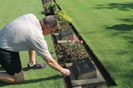 A small Poppy Cross on an unknown Grave.