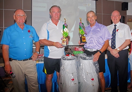 Derek Brook (left) and Graham Macdonald (right) with the winners of this year’s Poppy Golf.