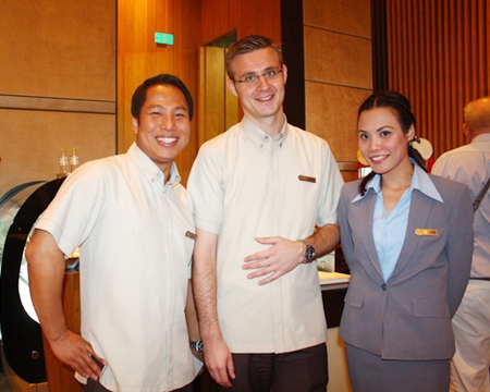 (L to R) Sunday, Simon and Aum help ensure the success of the Christmas Bazaar at the Hilton Hotel, Pattaya.
