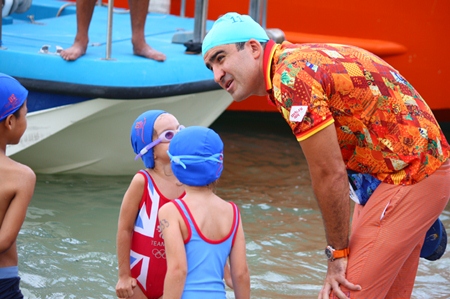 Mark Lunev gives last minute pointers to his daughter before the Fun Swim Competition.