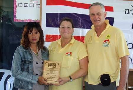 Gale and Bryan are quite moved by the Rotarians generosity. 