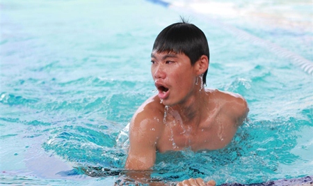 Made it! A student finishes his race at GIS.