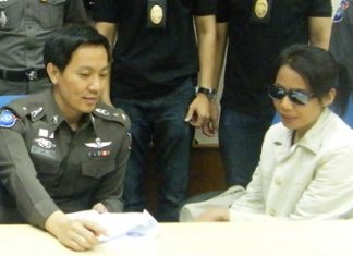 Jidapa Mul-udd (right) was caught at the Cambodian border in Chantaburi.