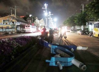 Police redirect traffic whilst waiting for a crew to arrive to remove the downed pole.