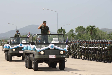 Maj. Gen. Noppadol Suphakorn inspects formations at the Sattahip command center. 