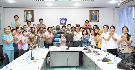 An international contingent of committee members from Save the Children Sweden meets in Banglamung to review local efforts to protect women and children from physical and mental abuse. 