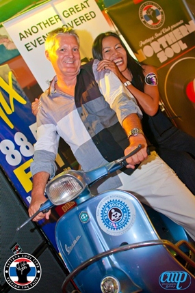 Johnny Diamond and Noy “ride the Vespa”.