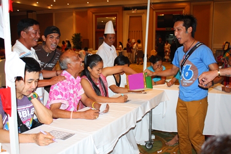 Employees play a wild and crazy game of bingo to raise money for the Dusit Smile project & Operation Smile Thailand.