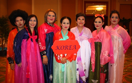 The pink team dons Korean national dresses for the contest.