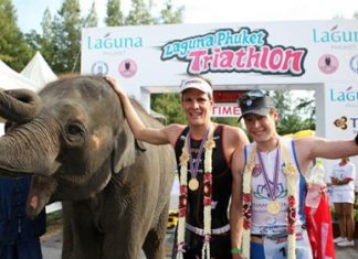 Ruedi Wild (left) won first place, with Tim Meyer (right) following close behind to win second place at the Laguna Phuket Triathlon.
