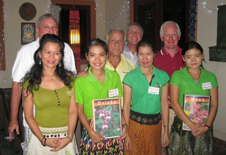 Tuesday’s winners pose with the staff at The Relax Bar. 