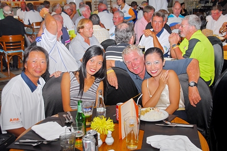 Golfers and partners enjoy the post-golf dinner buffet at Tavern by the Sea.