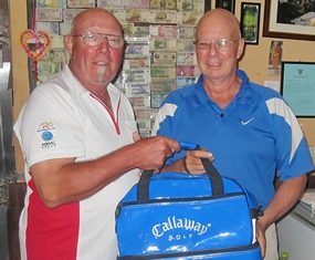 Max (left) presents the MBMG Golfer of the Month award to Brian Parish.