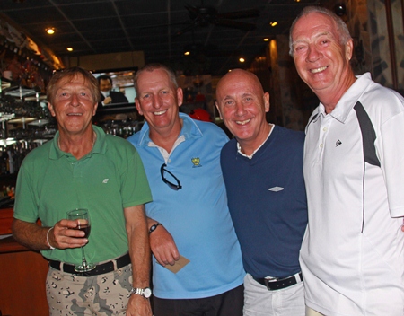 Friday winners Bill, Ian, Mick and Pierre celebrate at the bar.