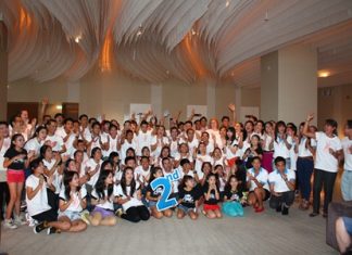 Hilton employees and Praw Studio students pose for a group photo to celebrate the 2nd anniversary of Hilton Pattaya Hotel.