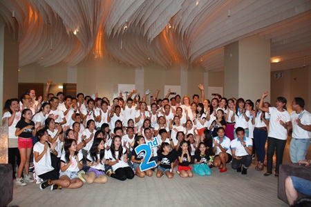 Hilton employees and Praw Studio students pose for a group photo to celebrate the 2nd anniversary of Hilton Pattaya Hotel.   