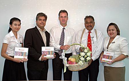 Resident Manager Richard Margo (centre), Alisa Sribuddee (left) and Public Relations Manager Pichaya Nitikarn (right) of Amari Orchid Pattaya stopped by to congratulate Peter and Tony Malhotra on the successful move to our new business premises on Thepprasit Road recently.