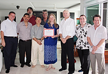 Skål International Chiang Mai president Annette Kunigagon is presented with a Membership Development Certificate on behalf of her club, by Skål International Thailand president Andrew J Wood (third from right). The certificate recognises Annette’s remarkable efforts in recruiting new Skål members in Chiang Mai and Northern Thailand (more than 10% in the past 12 months), leading her dedicated volunteers that make up the Chiang Mai club’s executives. The presentation took place during the half-yearly meeting of the Skål Thailand executive committee held in Chiang Mai recently. Also pictured, left to right, are Claude Sauter, Somsak Kiratipanich, Scott Smith, Jaffee Yee, Dale Lawrence, Brinley Waddell and Bob Lee.
