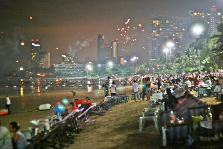 This scene from Loy Krathong last week is typical along Pattaya Beach on all major holidays - smoke fills the air from unregistered fireworks being shot off, up and down the beach, with the area sometimes resembling a war zone.