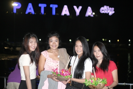 Lovely lasses create a picture perfect postcard of their Loy Krathong experience at Bali Hai in South Pattaya.