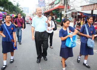 Mr Condom himself, Mechai Viravaidya marches in the parade with students from his new Mechai Pattana School & Kelly Lifelong Learning Center at the Birds & Bees Resort in Pattaya. <http://mechaifoundation.org/school_birdsbees.asp>