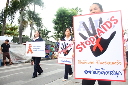 Women from Banglamung Red Cross take part in the AIDS campaign parade.