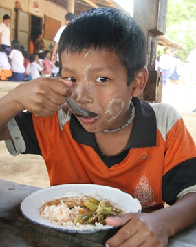 Just one of the thousands of children in Mae Sot who receive a nutritious school lunch each day.