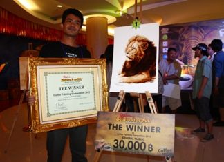 Sombun Unnpracha won 30,000 baht in the general-public category of the painting with coffee contest.