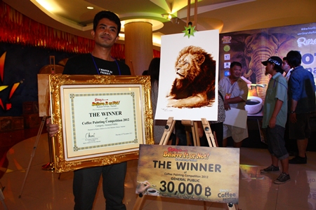 Sombun Unnpracha won 30,000 baht in the general-public category of the painting with coffee contest. 