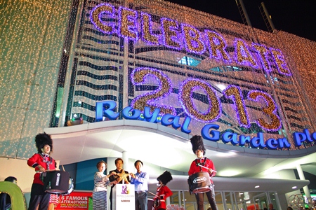 (L to R) Parida Vimolpand, general manager of the Royal Garden Plaza; Banjong Banthoonprayuk, member of the Pattaya city council; and Somporn Naksuetrong, vice president of Royal Garden Plaza & Entertainment, switch on the thousands of lights decorating the front of Royal Garden Plaza. 