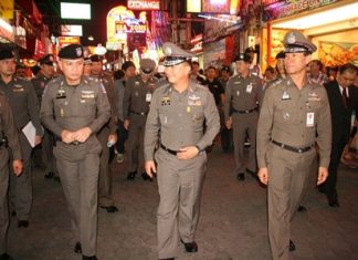 Gen. Adul Saengsingkaew (2nd right) tours Walking Street with local commanders and officers.