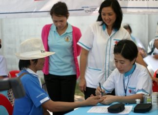 Doctors and city officials visit the Old Naklua Market neighborhood to administer medicine, provide checkups and give advice to those unable or unwilling to visit a hospital.