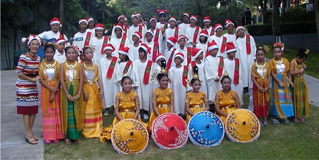 ‘Mother Superior’ (Toy) poses with some of her delightful charges at Pattaya Orphanage, as they assemble to perform for the lucky members & guests of Pattaya City Expats Club.