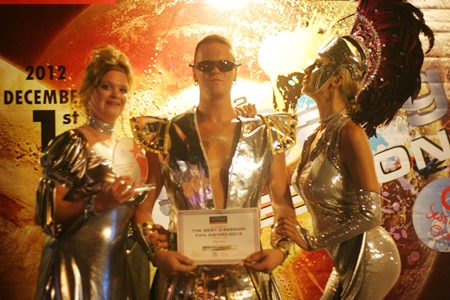 More winners of the “Outstanding Fan G 2012” award parade their costumes.