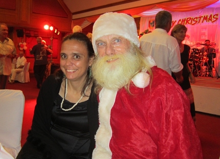 Santa poses for a photo with Margaret.