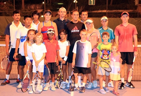The Russian tennis star is pictured (centre) with the participants of the Fitz Club Tennis Master Class after an energetic and productive session. 