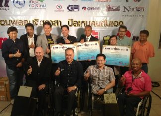 The Redemptorist Vocational School for People with Disabilities was deservedly presented with an outstanding service award in appreciation of their dedication and service to the community, more especially for promoting human rights and equality for all human beings. Amongst the guests at the presentation were (standing) Transport Minister Chatchart Sittipan (2nd left), Mayor Itthiphol Kunplome (4th left), Nong Nooch Tropical Garden owner Kampol Tansaccha (4th right), Father Dr Picharn Jaiseri and Somrit Chapiro. Front row: Jens Maspfuhl (left), RVSPD Principal Suporntham Mongkolsawat (2nd right) and Manop Eiemsa-art (right).