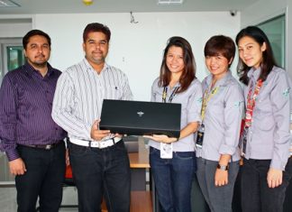 Pattaya Mail received more greetings from our friends at the Hard Rock Hotel when Kanjana Ngamkalong (3rd right), Marketing Communications Manager and her assistant Chanida Sinman (2nd from right) presented a new year’s gift to Suwanthep Malhotra and Kamolthep Malhotra, directors of the Pattaya Mail Media group during their visit to our new offices on Thepprasit Road recently.