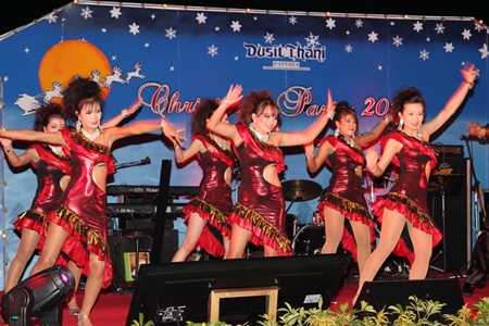 Women dress in their best Christmas outfits to perform their special show at Dusit Thani Hotel, Pattaya.