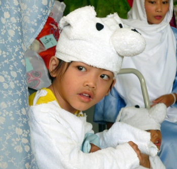 Fahsai plays a sheep in the nativity story at the Camillian Home in Lat Krabang.