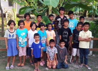 Some of the children pose for a commemorative photo in the garden.
