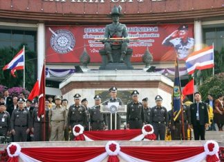 National Police Chief Adul Saengsingkaew (center), flanked by top deputies from Bangkok, top Chonburi police officials and Mayor Itthiphol Kunplome, orders nearly 600 area police officers to crack down on crime during the heart of Pattaya’s high-season.