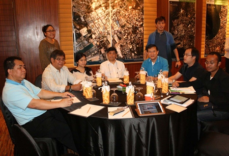 With aerial photos dominating the walls behind them, officials from the Science Ministry’s Geo-Informatics and Space Technology Development Agency discuss how to get a better grasp on environmental changes affecting the kingdom by watching the country from space.